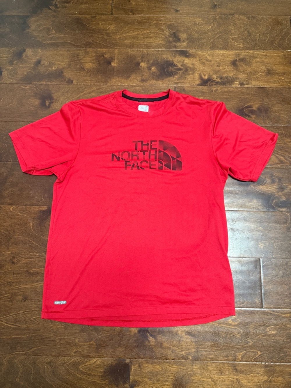 The North Face Red Short-Sleeve Logo Tee with Black Chest Marking